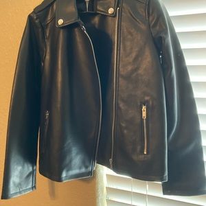 Kids faux leather black jacket. Brand is from Mango. Never worn still new.